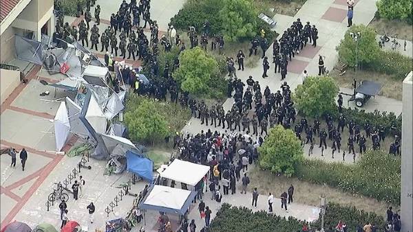 Police descend on UC Irvine campus as protesters occupy lecture hall