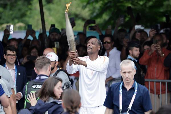 Paris Olympics: Snoop Dogg lights up torch run